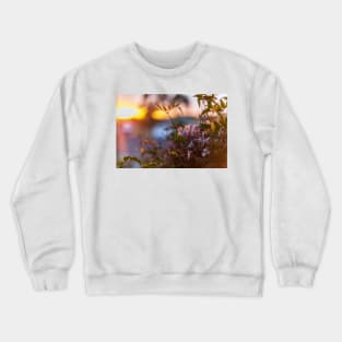 Sunset and flowers close up Crewneck Sweatshirt